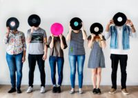 Music Fans holding Record Labell