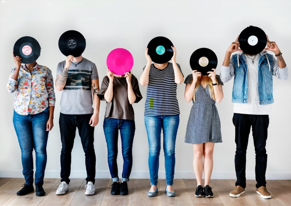 Music Fans holding Record Labell